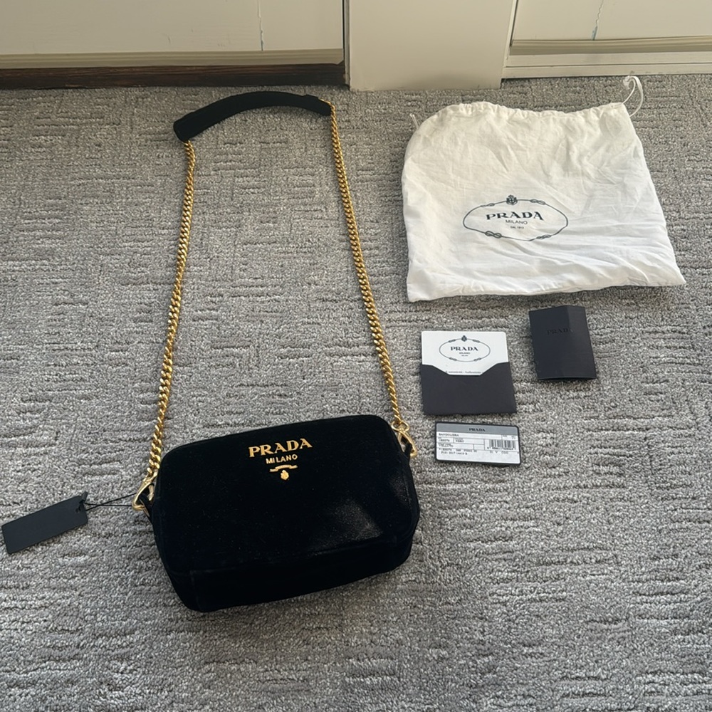 New with tags Prada Bandoliera Veluto bag in nero.